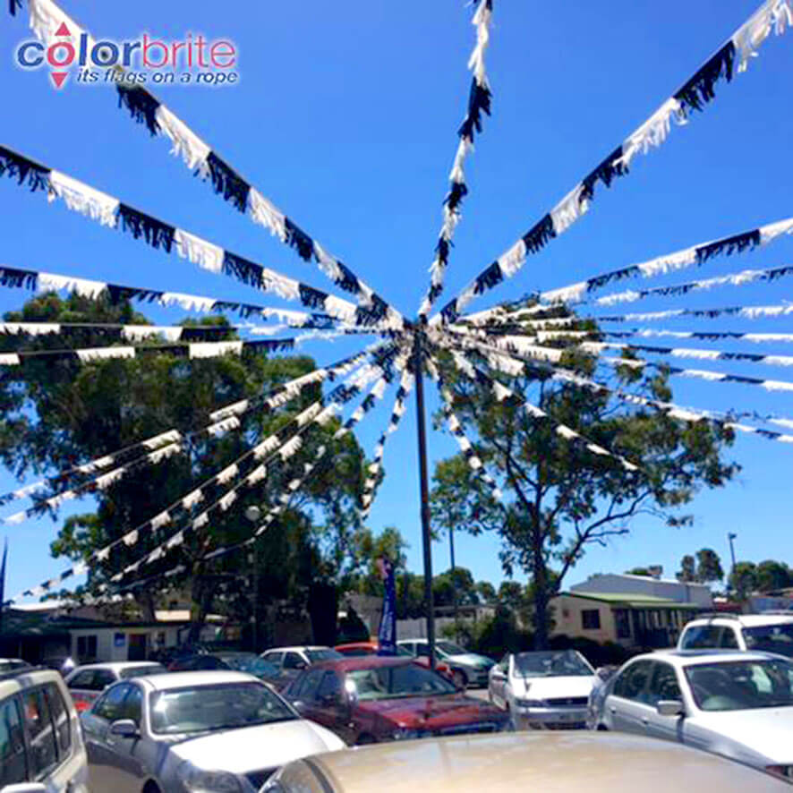 See the movement; Hear the flutter - Draw the Customer to your yard with good visual merchandising.